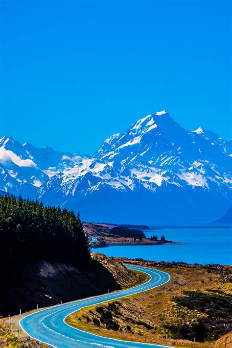 Road Along Lake Pukaki Leading To Mt Cook In Background New Zealand