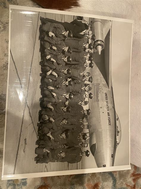 Found this picture of my grandpa. He is on the bottom row, second to ...