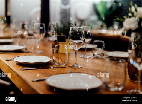 Luxury Table Settings For Fine Dining With And Glassware Pouring Wine