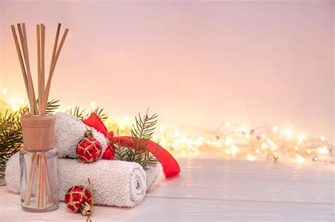 Premium Photo Christmas Spa Composition With Incense Sticks Towels