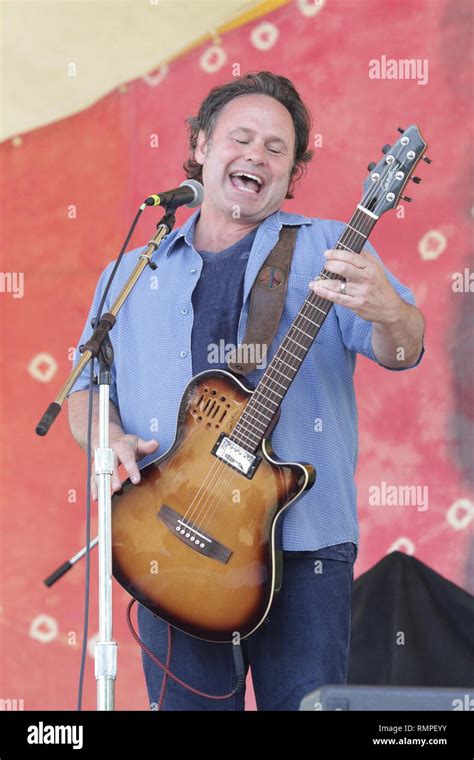 Musician Martin Sexton Is Shown Performing On Stage During A Live Concert Appearance Stock