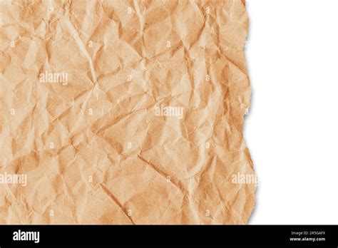 Recycled Crumpled Orange Paper Texture With A Torn Edge Isolated On