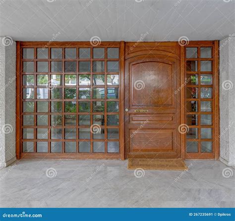 An Elegant Apartment Building`s Entrance Solid Wood And Glass Door Stock Image Image Of Facade