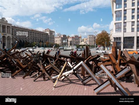 People Walk Past Tank Obstacles At Independence Square In Kyiv Ukraine