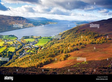 The village of Kinloch Rannoch and Loch Rannoch in the autumn viewed from Craig Var,Perthshire ...