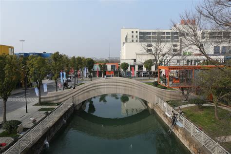 World's Largest 3D-Printed Concrete Pedestrian Bridge Completed in ...