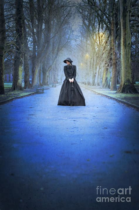 Sad Victorian Woman Alone In A Park At Dusk Photograph By Lee Avison