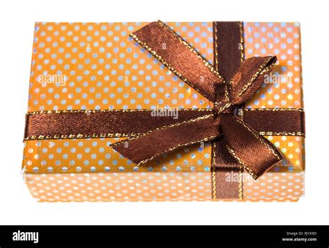 Shiny Yellow T Box Tied By Brown Ribbon With Bow Cutout On White