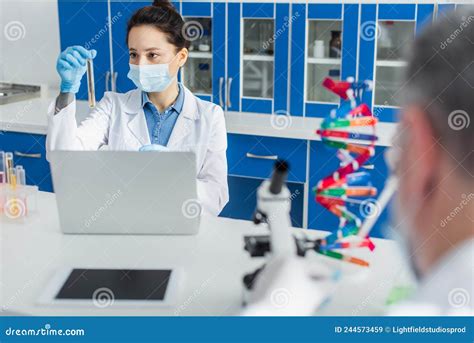 Geneticist In Medical Mask Working With Stock Image Image Of