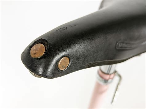 pink metal and leather 1960/70s occasional stool Sella by Castiglioni