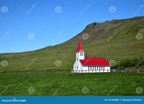 A Small White Church in Iceland with a Red Roof. Stock Image - Image of light, cross: 131090587