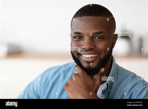 Closeup portrait of handsome smiling african american man touching ...