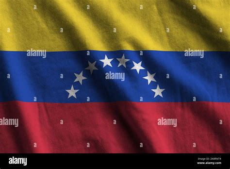 Venezuela Flag With Big Folds Waving Close Up Under The Studio Light