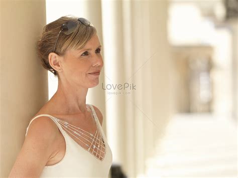 Woman Leaning On A Pillar Picture And Hd Photos Free Download On Lovepik