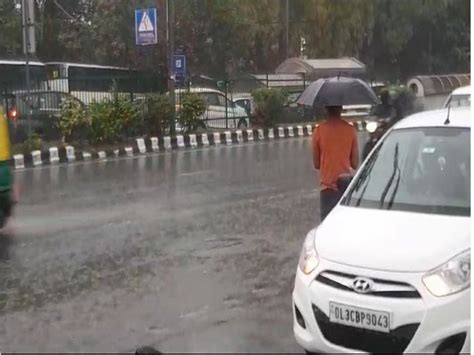 Rain Accompanied By Gusty Winds Lashes Parts Of Delhi