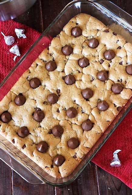 A Chocolate Chip Cookie In A Glass Baking Dish On A Red Towel And