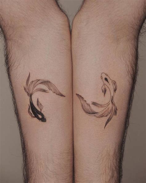 Yin Yang Fish Tattoo On The Inner Forearm Yin Yang Tattoos Koi Fish