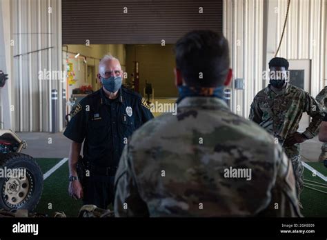 Chris Magnus Chief Of The Tucson Police Department Interacts With An