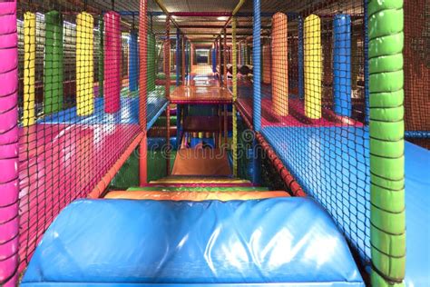 Kids Running Inside A Colorful Indoor Playground Stock Photo Image Of