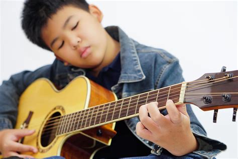 Guitar Child Stock Photos, Images and Backgrounds for Free Download