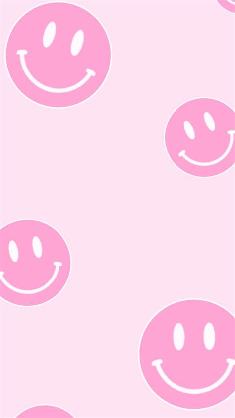 Pink Smiley Face Wallpaper With Four Different Faces