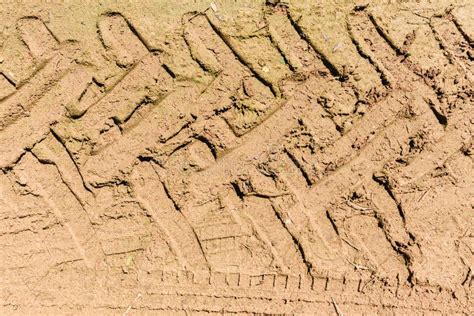 Tractor Wheel Tire Tracks In Dry Mud On Dirt Road Stock Image Image