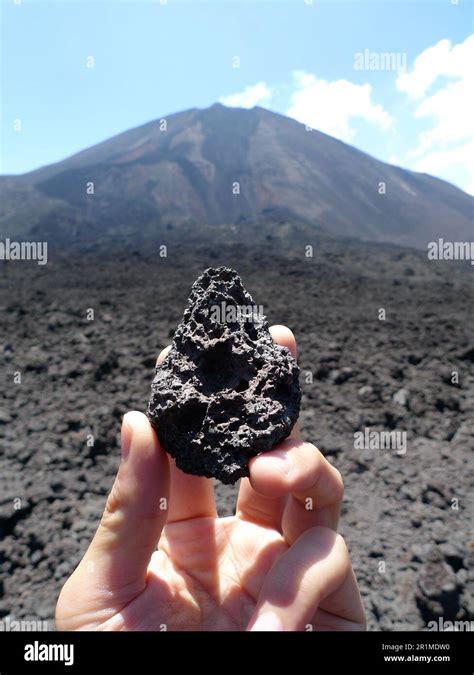 Pacaya Volcano Hiking Tour With Volcanic Rocks In Guatemala Stock Photo