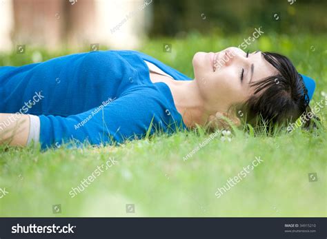 Attractive Woman Relaxing On Grass Park Stockfoto 34915210 Shutterstock