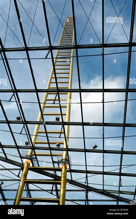 Golden Ladder Soaring Into The Sky Through Glass Roof Artistic Landmark Of The New Forum