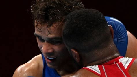 Moroccan Olympic boxer channels Mike Tyson with attempted ear bite ...