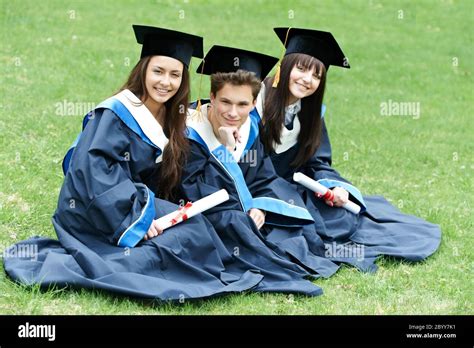 happy graduation students Stock Photo - Alamy