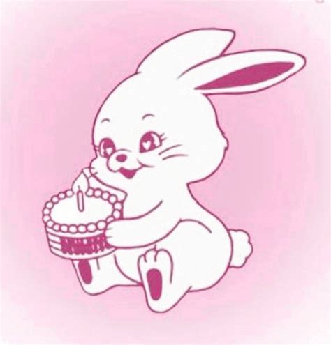 A Drawing Of A Bunny Holding A Cake