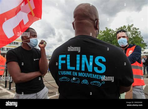 Renault Workers Wear Protective Face Masks As They Stage A Protest