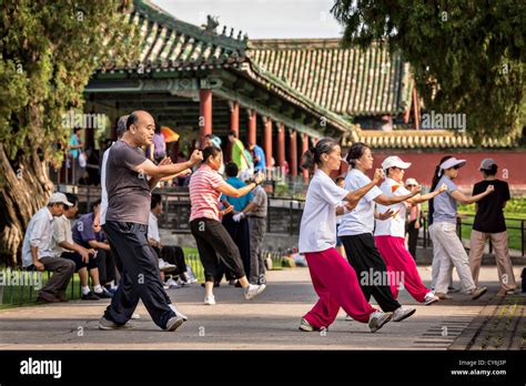 Chinese People Practice Tai Chi Martial Arts Exercise Early Morning