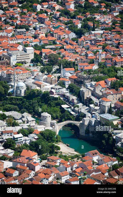 An Aerial View Of The Neretva River Which Runs Across Old Mostar And