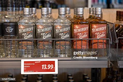 Bottles of vodka on display at the newly opened Lidl Ltd. supermarket ...