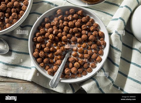 Sweet Cocoa Chocolate Sugar Cereal Puffs With Milk Stock Photo Alamy