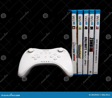 Nintendo Wii U Pro Controller and Games Editorial Stock Photo - Image ...