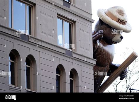 The Smokey Bear Balloon Floats In The Macys Thanksgiving Day Parade On