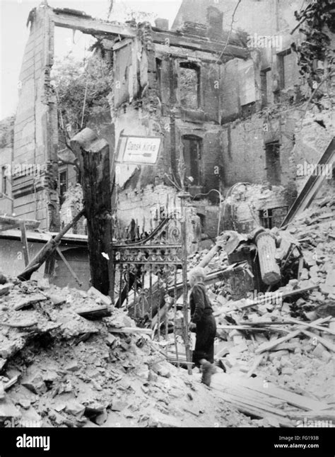 World War Ii Berlin 1945 Na Boy Walking Through The Rubble In