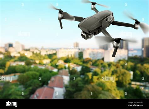 Modern Drone Flying Over City Aerial Survey Stock Photo Alamy