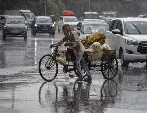 Rain Lashes Delhi Ncr Brings Respite From Scorching Heat India News