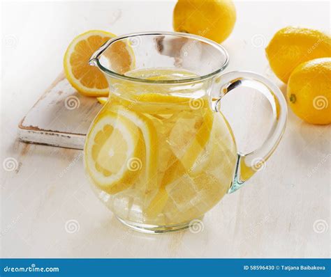 Water With Lemon And Ice In A Glass Jug Stock Photo Image Of Fruit