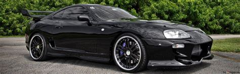 Black Toyota Supra in the woods HD wallpaper download