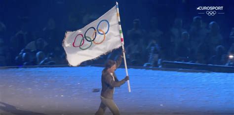 Embarrassment Or Best Part Tom Cruise Flies To Carry Olympic Flag At Closing Ceremony