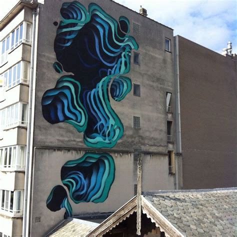 Street Artist Spray Paints Boring Buildings With Optical Illusions That