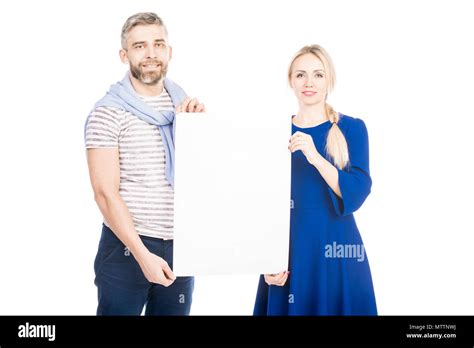 Couple with poster Stock Photo - Alamy