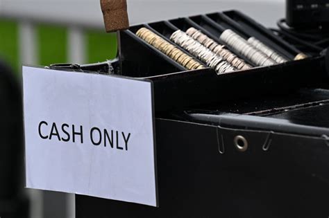 Shoppers forced to use 'cash only' as global outage puts payments at