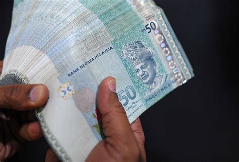 Ringgit Opens Marginally Higher Against US Dollar