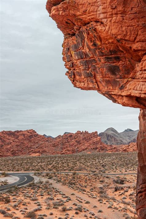 Flat Red Rock With Holes Valley Of Fire Nevada Usa Stock Photo